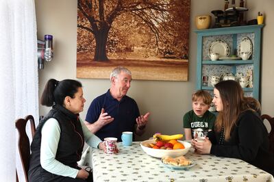 Frank McShane with (from left) Liliia, Fylypp and Kateryna. Photograph: Dara Mac Dónaill