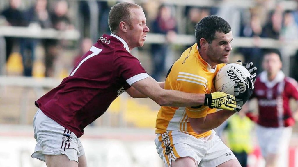 Clontibret’s Eoin Greenan holds possession despite the close attentions of  Conan Cassidy of Slaughneil during the Ulster Club Senior Football Championship semi-final at Healy Park. Photograph: Inpho.