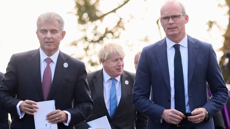 Secretary of State for Northern Ireland Brandon Lewis, UK prime minister Boris Johnson and Minister for Foreign Affairs Simon Coveney at the service to mark the formation of Northern Ireland at St Patrick’s Church of Ireland Cathedral in Armagh. Photograph: Press Eye