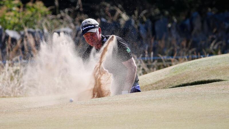 Darren Clarke fails to get his ball out of the bunker on the 6th hole during the second round of the British Open. Photograph: Rob Carr/Getty Images