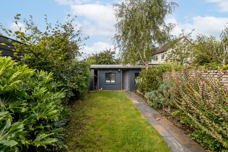 Boiler house and a big utility/garage/workshop with an up-and-over door leading out to a lane providing access to an allotment