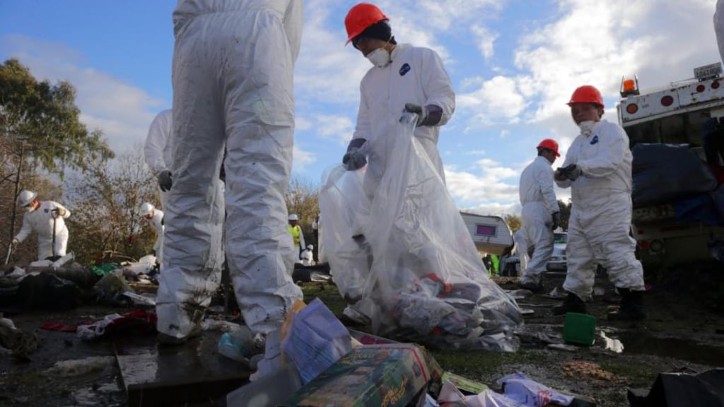 Cleaning up  The Jungle, a homeless camp of some 350 tents and shacks in San Jose. Photograph: Jim Wilson/The New York Times