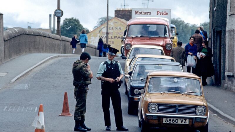 An RUC and British army vehicle checkpoint in Strabane, Co Tyrone during The Troubles in 1978. Photograph: Alain Le Garsmeur/Getty Images