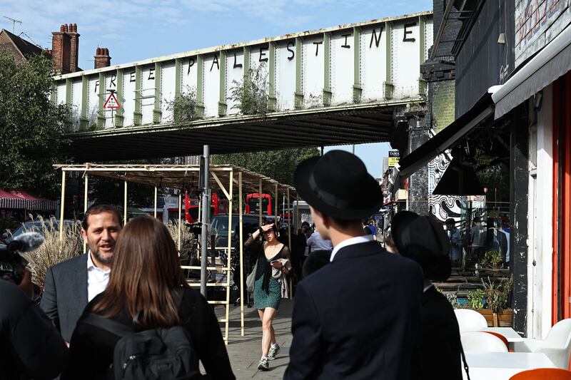 Graffiti reading 'Free Palestine' on a railway bridge in Golders Green, north London. Photograph: Henry Nicholls/AFP via Getty Images