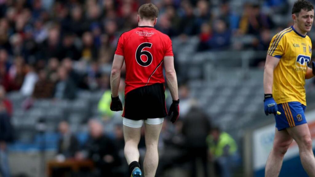 Brendan McArdle of Down leaves the field after being sent off against Roscommon in the Division Two league final. Photo: Donall Farmer/Inpho