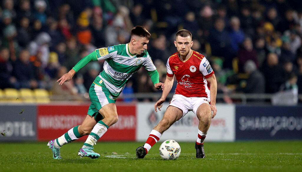 Rovers’ Darragh Burns and Aaron Bolger of St. Patrick's Athletic. Photograph: Ryan Byrne/Inpho