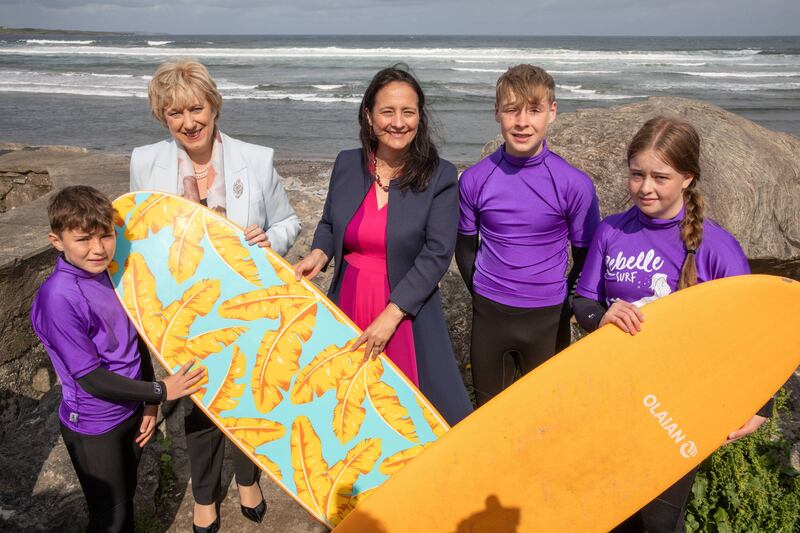 Ministers Heather Humphreys and Catherine Martin with surfers Jack Leyden, Adam Leyden and Allanna Herity at the official opening of the new state-of-the-art National Surf Centre.