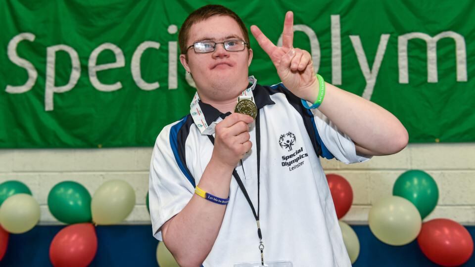 Team Leinster athlete Daniel Somers from Rathfarnam, Dublin celebrates with his gold medal after winning the Bocce Division 17 singles competition. Photograph: Diarmuid Greene/Sportsfile