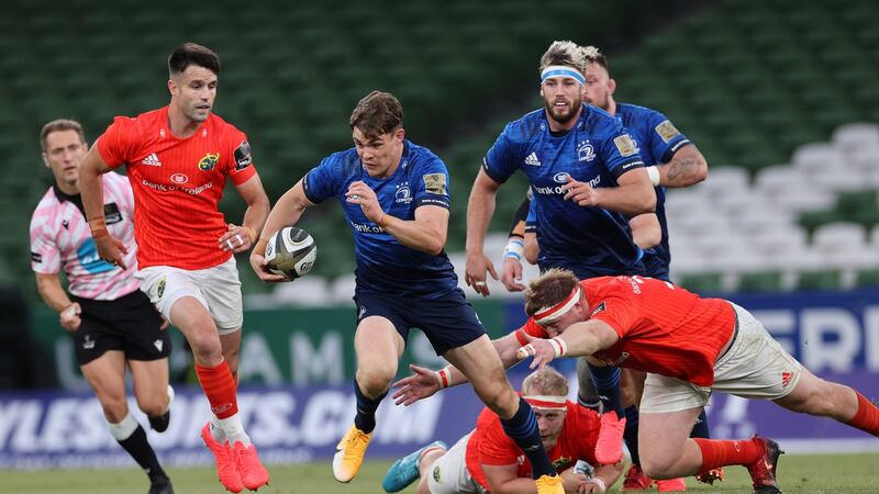Garry Ringrose makes a break during the Guinness Pro 14 game against Munster at the Aviva Stadium. Photograph: Billy Stickland/Inpho