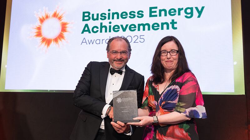 Aideen O'Hora, awards judge, presents the energy leader 2025 to David Maguire