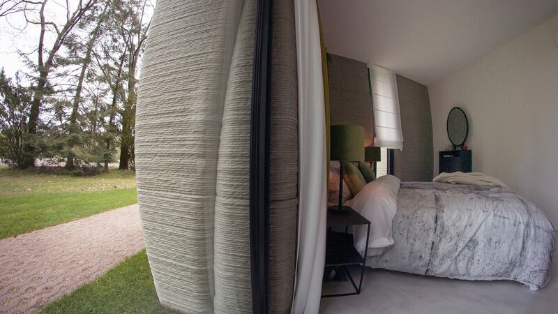 A view of the bedroom showing the printer layers in the walls of the house. Photograph: Peter Dejong/AP