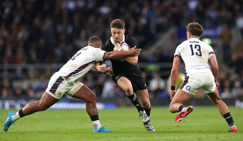 New Zealand's Beauden Barrett is tackled by England's Ollie Lawrence (left) and Henry Slade during during their Autumn Nations Series fixture at Twickenham. Photograph: David Rogers/Getty Images