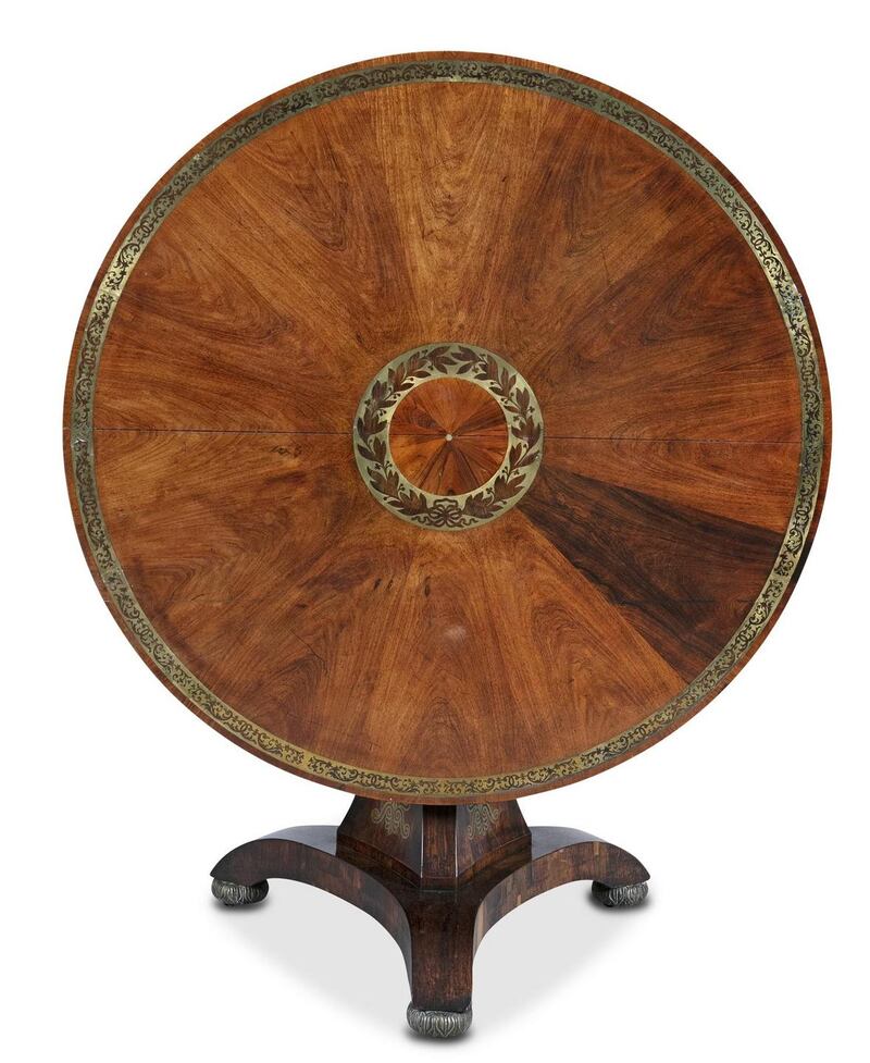 Lot 235: A Regency rosewood brass banded dining table €3,000-€4,000