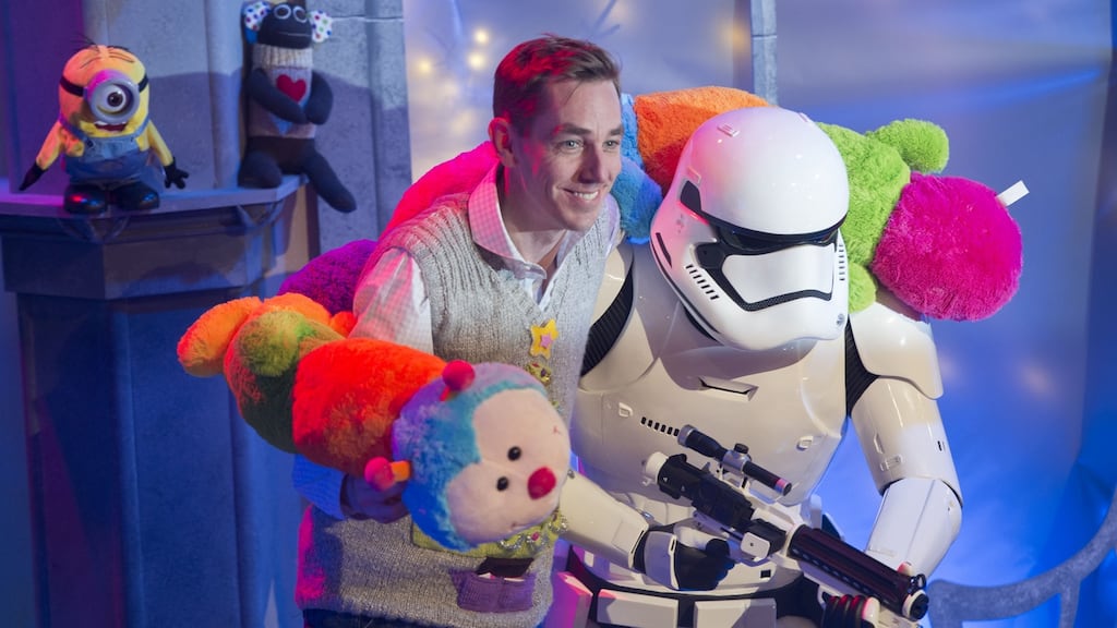 Finger on the pulse: Ryan Tubridy on the set of the 2015 Late Late Toy Show with a stormtrooper from Star Wars: The Force Awakens, a movie which itself has been a big hit with audiences since its recent release. File photograph: Brenda Fitzsimons/The Irish Times