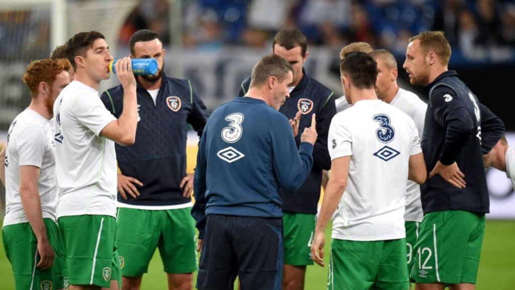 Republic of Ireland assistant manager Roy Keane gives a team talk to the players before the game against Germany at the Veltins-Arena, Gelsenkirchen. Photo: Joe Giddens/PA