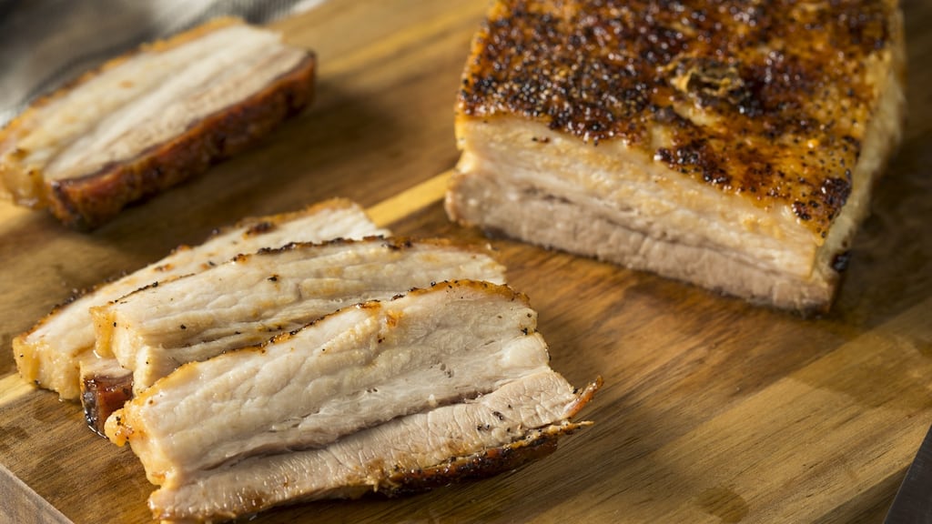 Serve pork belly with vegetables and apples. Photograph: iStock