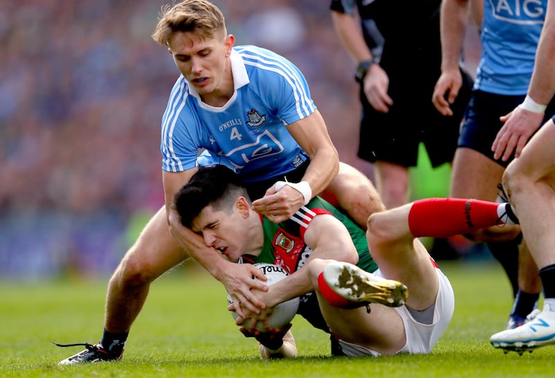 Michael Fitzsimons and Conor Loftus compete for possession in the 2017 All-Ireland final. Photograph: James Crombie/Inpho