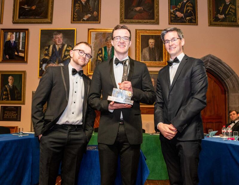 Dr Ronan Glynn (right) after handing the Demosthenes to Ross Merriman and Conor White from SADSI who won best team at the event. Photograph: John Allen/Provision