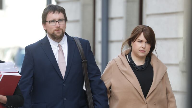 Stephen and Deirdre Feely leaving the Four Courts on Tuesday after a High Court action on behalf of their son Fionn was settled. Photograph: Paddy Cummins/IrishPhotoDesk.ie