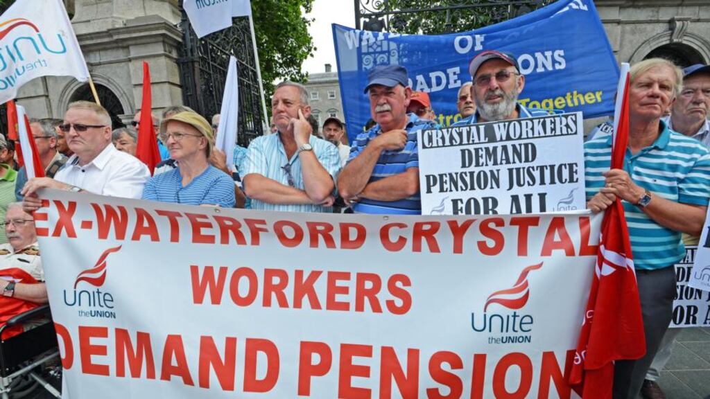 Former Waterford Crystal workers calling on the Government to protect workers’ pension entitlements in Dublin during July. Photograph: Eric Luke/The Irish Times