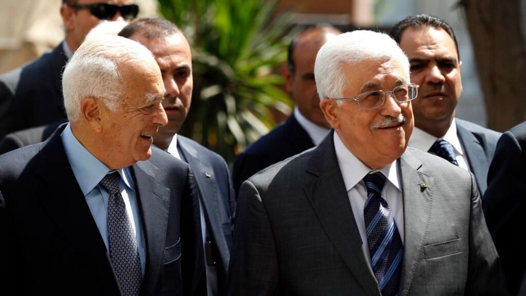 Arab League secretary general Nabil al-Arabi (left) welcomes Palestinian president Mahmoud Abbas to the Arab League foreign ministers’ meeting in Cairo, Egypt. Photograph: EPA