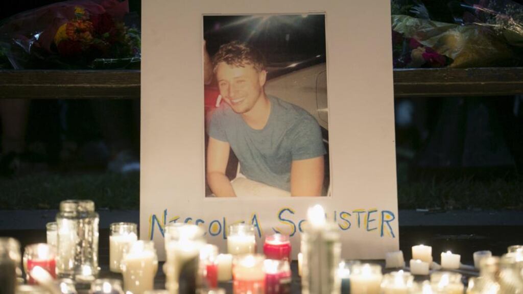 Niccolai Schuster’s picture at a candlelight vigil in Berkeley, California. Photograph: Elijah Nouvelage/Reuters
