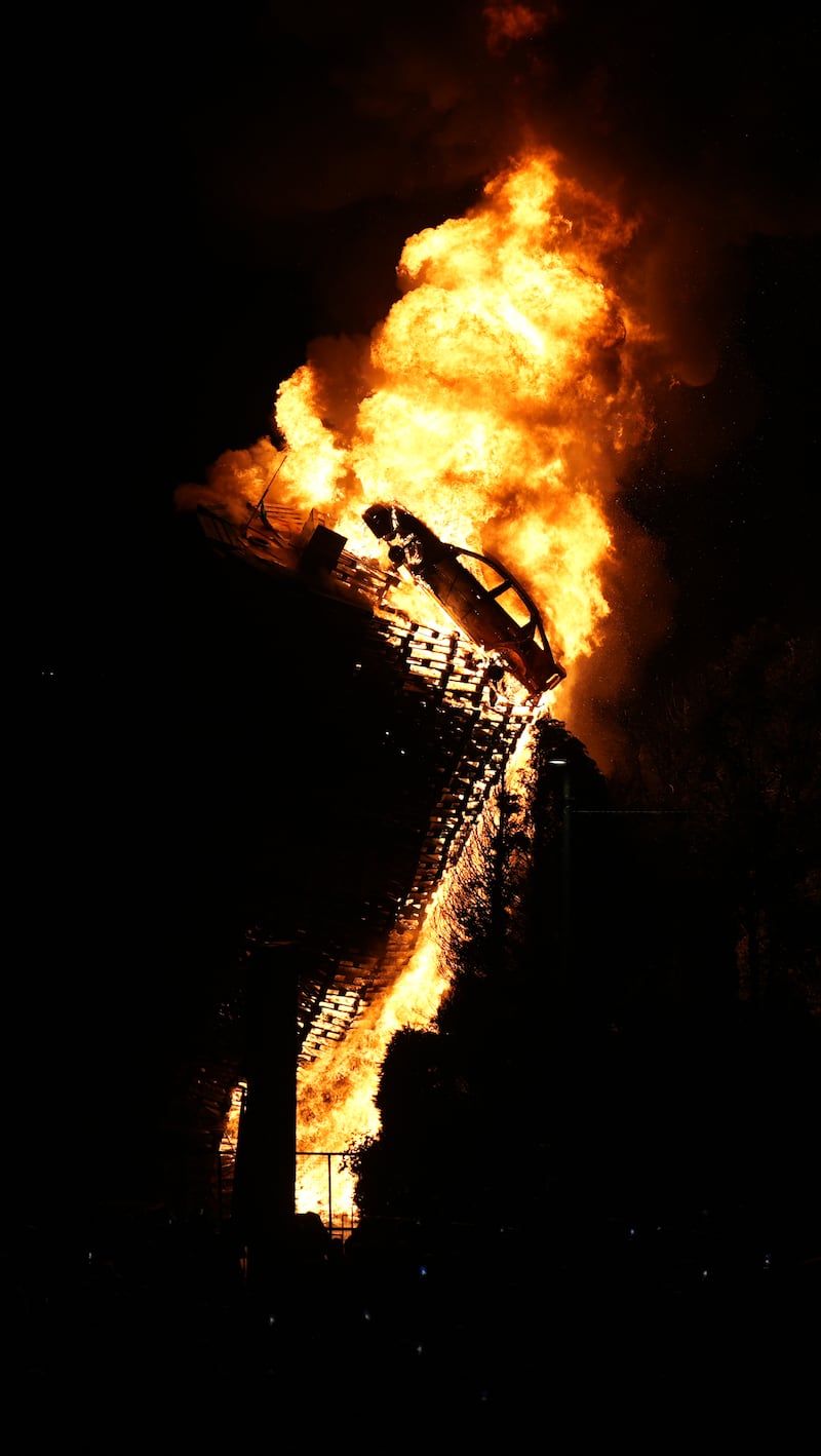 A mock police car is set alight on top of a bonfire in Moygashel near Dungannon, Co Tyrone. Photograph: Niall Carson/PA