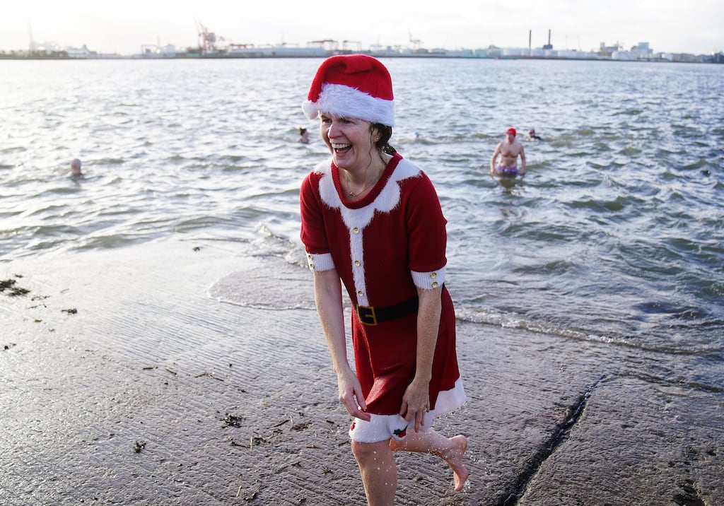 Eilis Patton, from North Strand, takes part in the Clontarf Yacht & Boat Club annual Christmas swim in aid of the RNLI, which she has been doing since the age of four. Photograph: Brian Lawless/PA