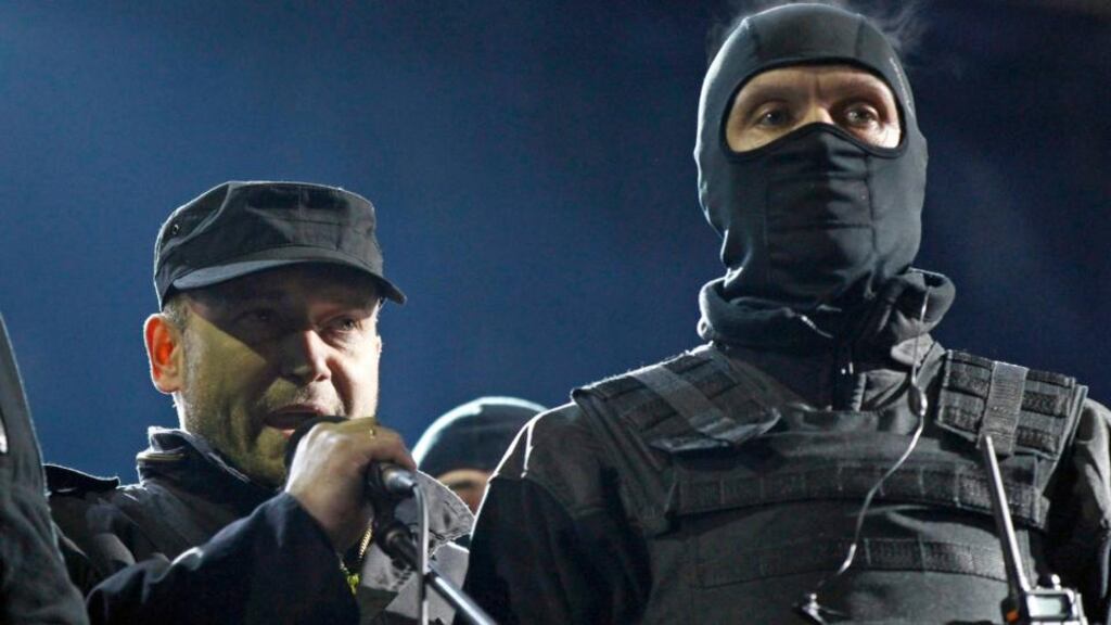 Dmytro Yarosh (left), a leader of the Right Sector movement: “We want to change the country. It will be difficult to compete with the political sharks but the revolution presents an opportunity to change the political elite and to bring young people into politics.” Photograph: Reuters/David Mdzinarishvili