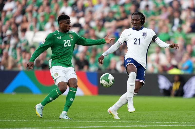 Republic of Ireland's Chiedozie Ogbene battles for the ball with England's Eberechi Eze. Photograph: Niall Carson/PA
