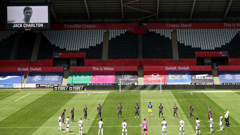 Swansea and Leeds players stand for a minute silence in memory of Jack Charlton before the match. Photo: Nick Potts/PA Wire
