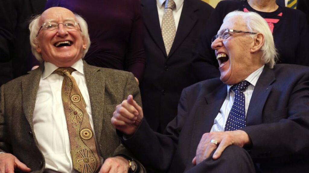 President Michael D Higgins  shares a joke with Ian Paisley, former First Minister of Northern Ireland, during a reception at Belfast City Hall to mark St Columbanus Day. Photograph: Paul Faith/PA Wire