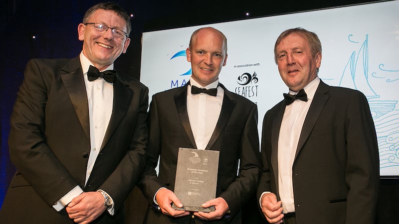 Minister Michael Creed and Liam Lacey, Director, Irish Maritime Development Office, IMDO, presents the Shipping Company of the Year award to Sean Harrington, Atlantic Towage & Marine.