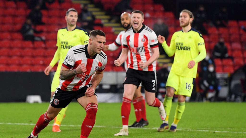 Billy Sharp celebrates after scoring from the penalty spot in the Premier League game against Newcastle at Bramall Lane. Photograph: Stu Forster/AFP via Getty Images