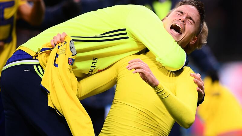 Celtic’s Mikael Lustig celebrates after Sweden qualified for the World Cup. Photograph: Marco Bertorello/AFP