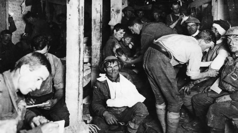 British tommies relaxing and having wounds treated in an underground dressing station in France. Photograph: Three Lions/Getty Images