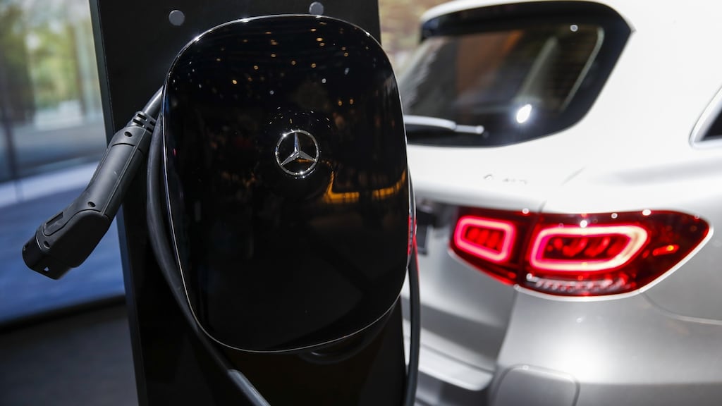 An electric car recharging ahead of the Geneva International Motor Show on Monday. Some European carmakers are said to be delaying electric car launches until the next round of European emissions legislation is introduced. Photograph: Stefan Wermuth/Bloomberg