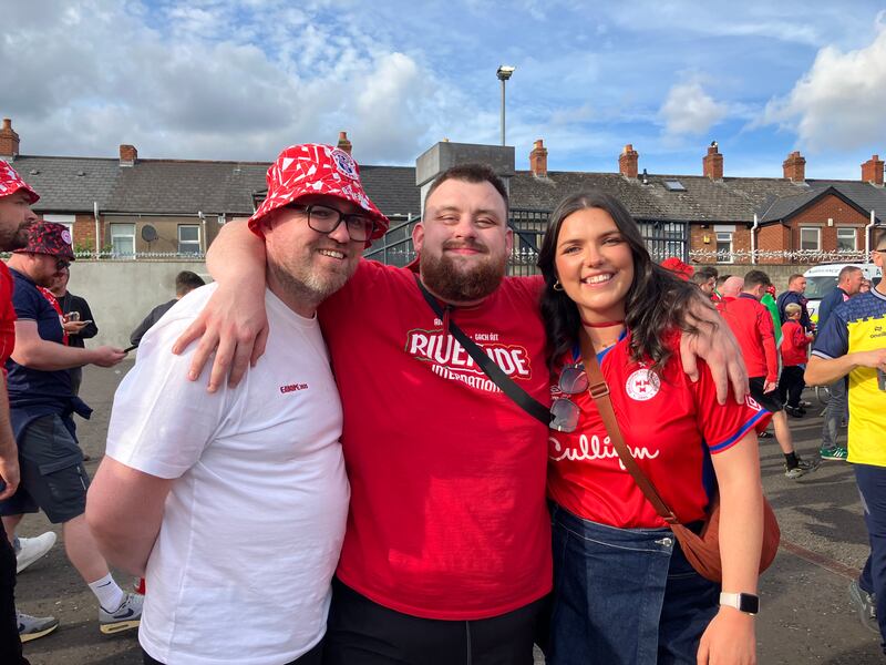 Ger Martyn, Adam Leonard and Amy Rooney were the among the fans who travelled from Dublin to Belfast for the Shelbourne vs Linfield match. Photograph: Seanín Graham
