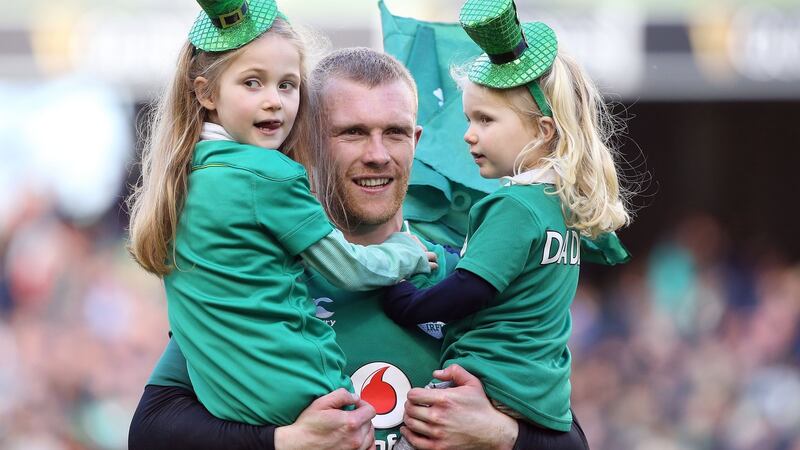 Keith Earls celebrates after the match with his daughters Ella May and Laurie . Photograph: Tom Honan/Irish Times