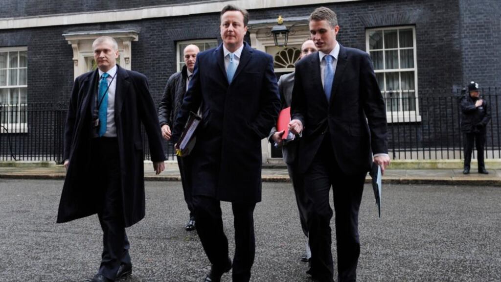 British prime minister David Cameron (centre) leaves Downing street to attend prime ministers questions at the Houses of Parliament. Photograph: Facundo Arrizabalaga/EPA