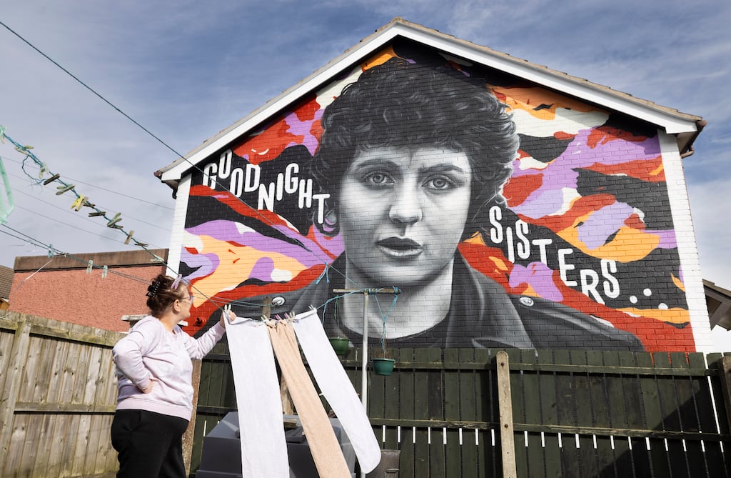 Eileen Allen in her back garden, where a mural of the late Nell McCafferty overlooks her home in the Bogside, Derry. Photograph: Joe Dunne