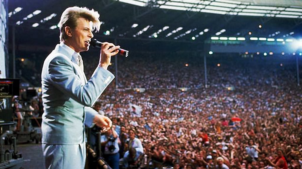 David Bowie performing at the Live Aid concert at Wembley Stadium, London, July 13th, 1985: He introduced harrowing video segment of huge suffering due to famine in Ethiopia.