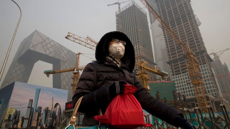 Analysts say it’s like peering through a fog trying to assess the prospects for the Chinese economy in 2017. Photograph: AP/Ng Han Guan