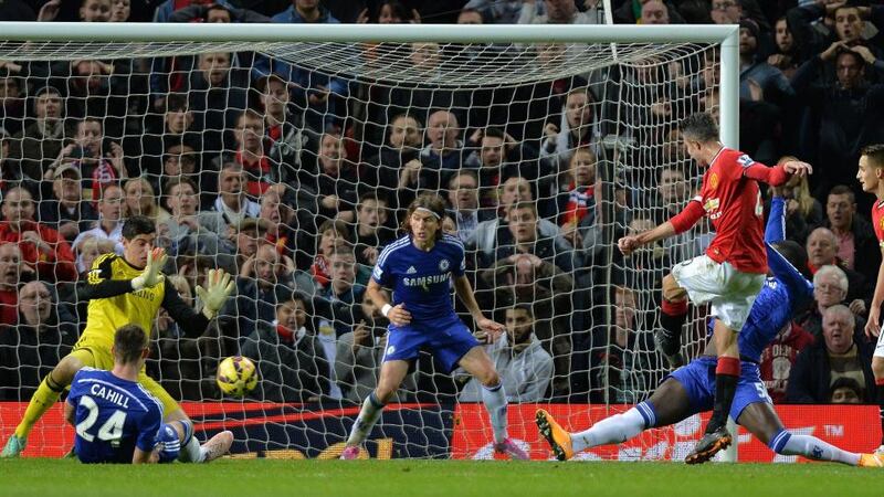 Manchester United’s Robin van Persie scores the equalising goal in injury time in the Premier League clash against Chelsea at Old Trafford. Photograph: Peter Powell/EPA