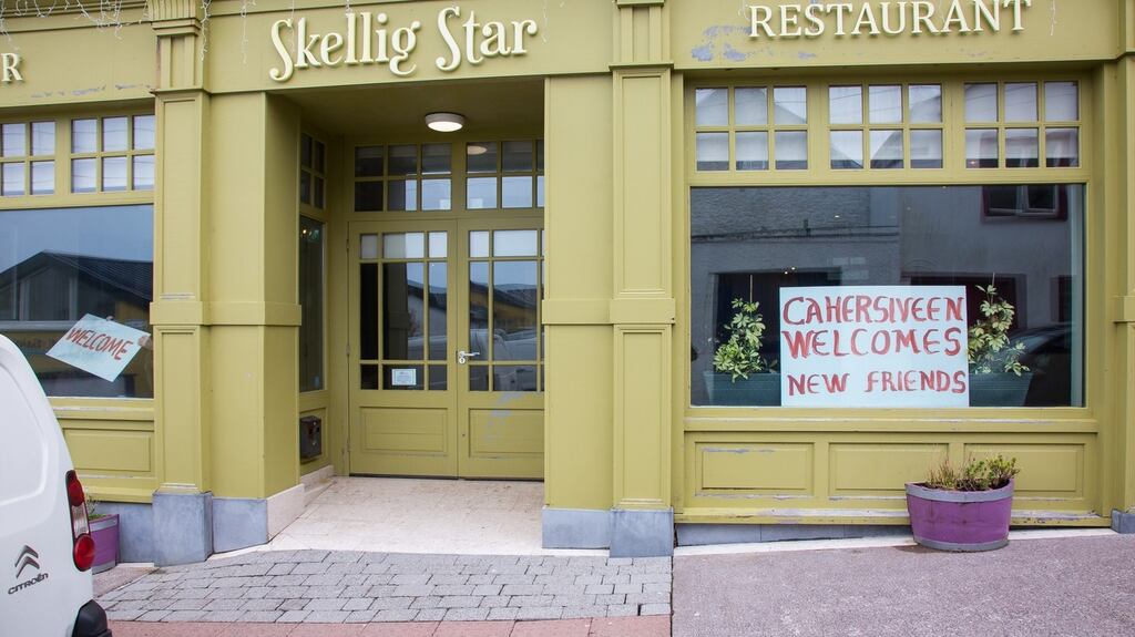 Welcome signs on the windows of the Skellig Star Hotel ahead of the arrival of the refugees. Photograph: Alan Landers
