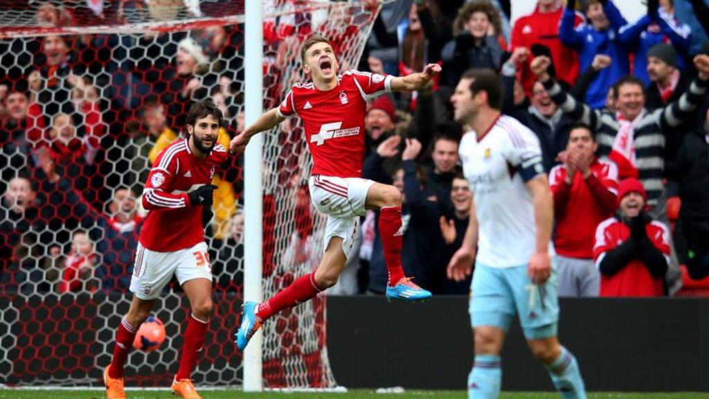 Jamie Paterson of Nottingham Forest celebrates after he scores their fourth goal and completes his hat-trick during the FA Cup third round match against West Ham at the City Ground. Photograph: Julian Finney/Getty Images