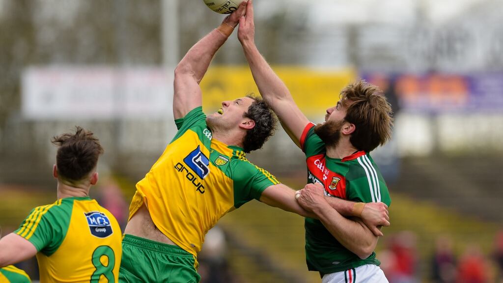 Aidan O’Shea in action against Michael Murphy in the Allianz Football League in Castlebar in April. Photograph: Tom Beary/Inpho