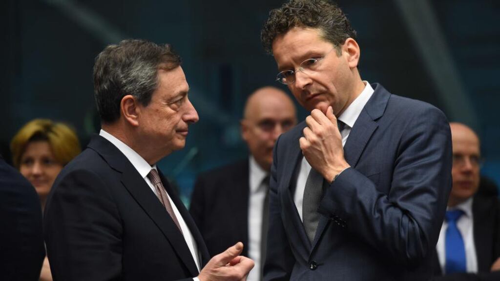 Eurogroup President and Dutch Finance Minister Jeroen Dijsselbloem (R) speaks with European Central Bank President Mario Draghi during a meeting of Eurogroup finance ministers at EU headquarters in Brussels. European finance ministers urged Greece to stop wasting time in talks on its crucial bailout as debt-stricken Athens warned of a possible referendum if its reform plans are rejected.  (Photograph: AFP/Getty Images)