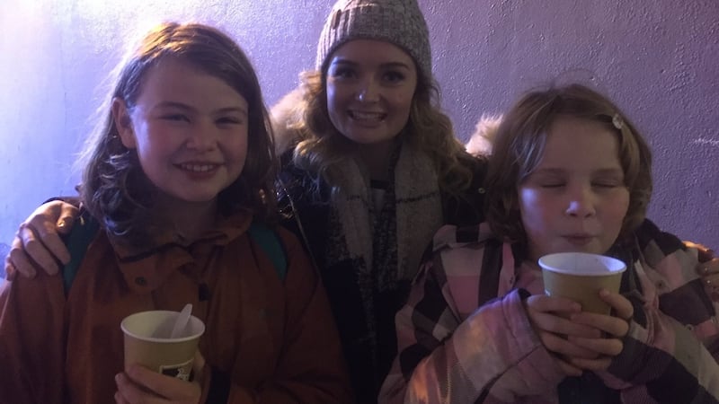 Two new pantomime fans, with Ciara Lyons from the Gaiety theatre’s Rapunzel
