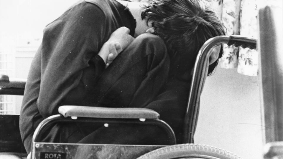 Views of St Ita’s Hospital, Portrane, in 1985: a patient in the male disturbed ward. Photograph: Matt Kavanagh